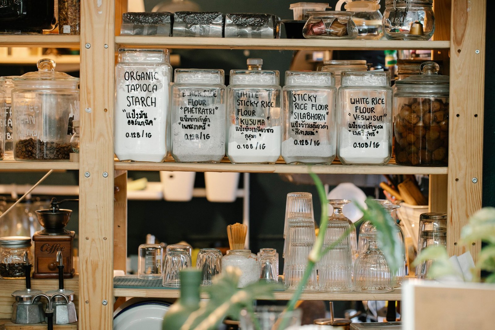 Baking ingredients grouped on shelves