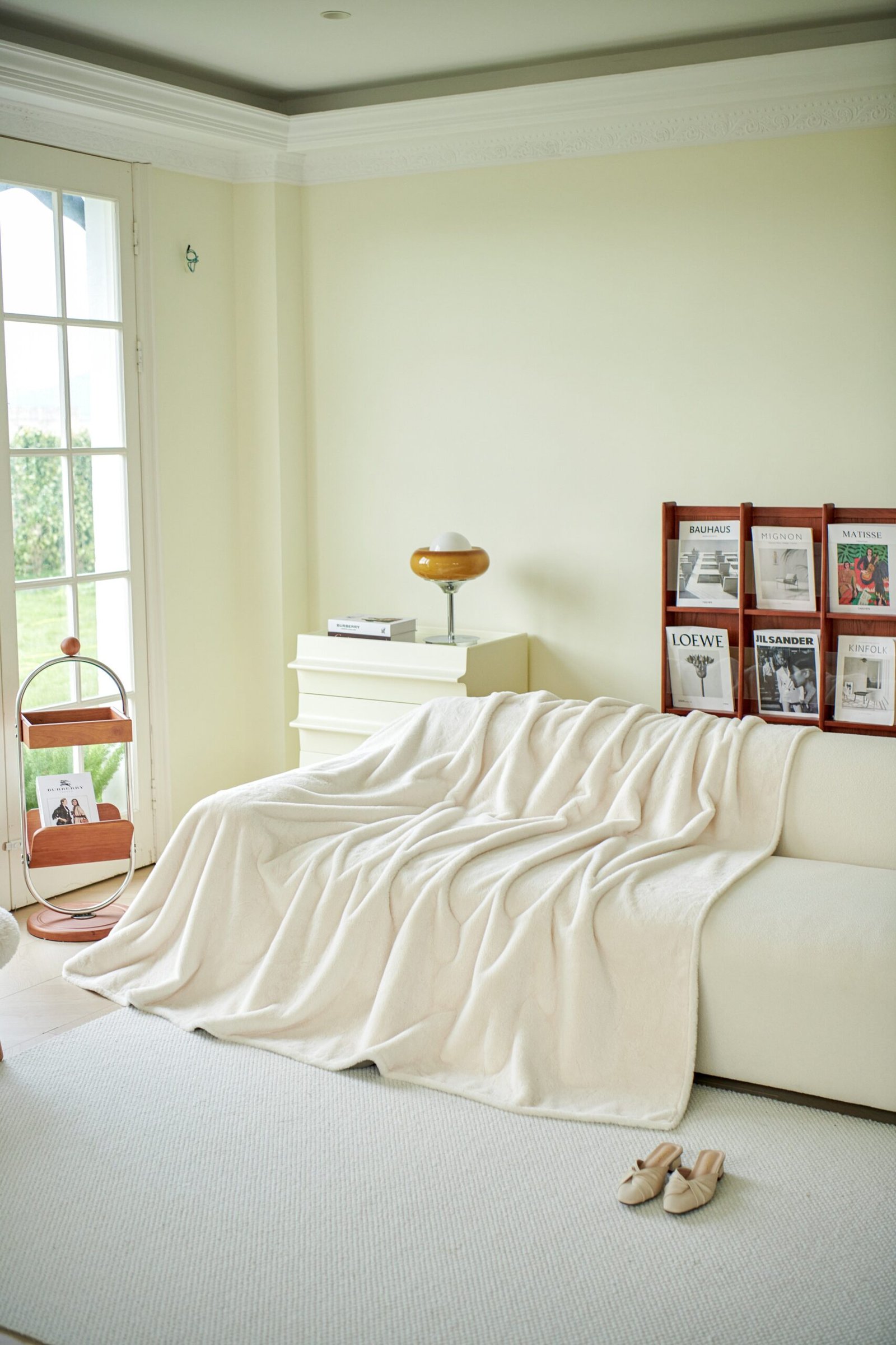Cozy sofa with throw blanket