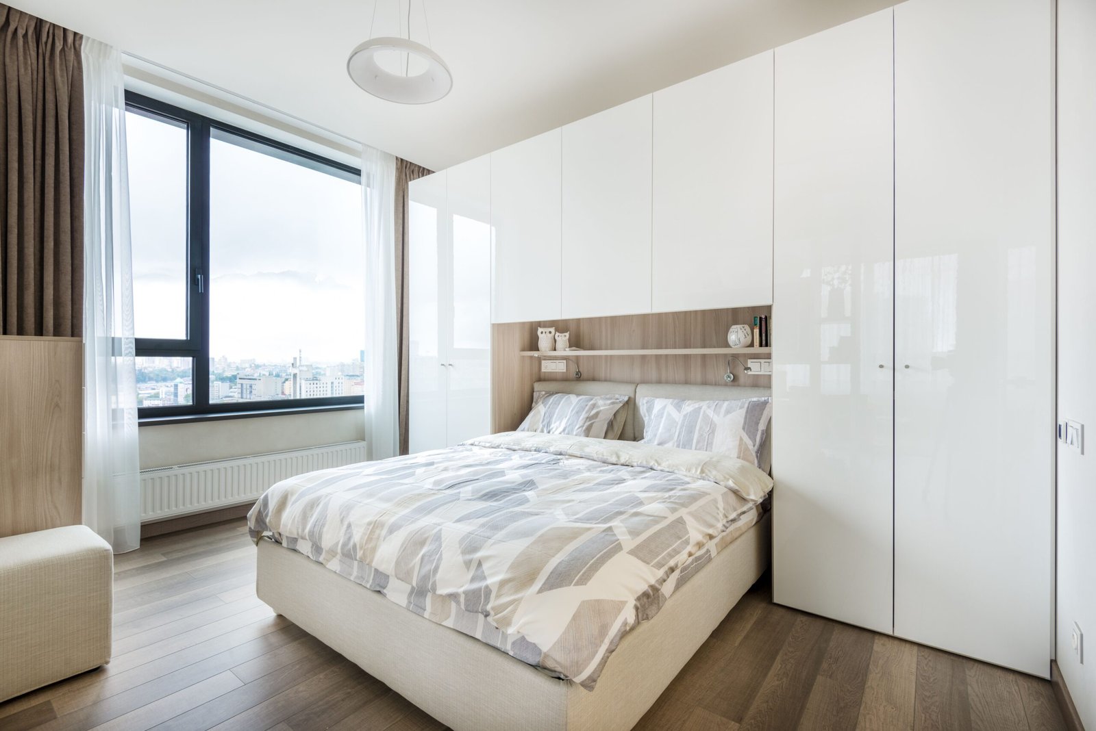 Bedroom with built-in closed wardrobe storage