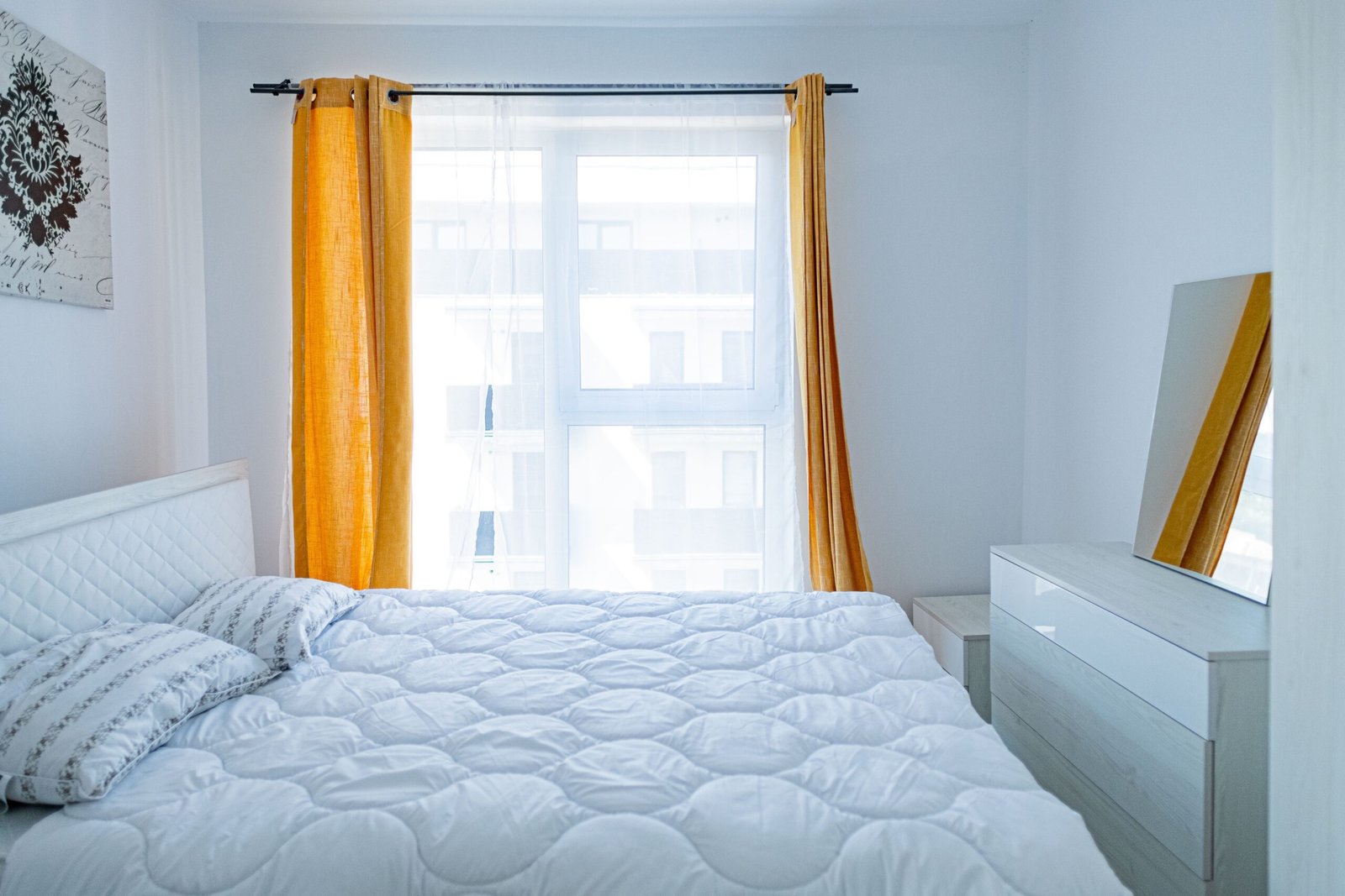 Bright bedroom curtains by window
